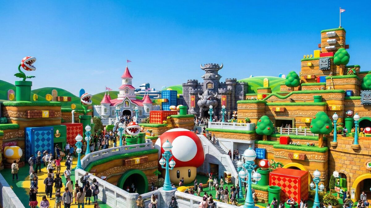 青空の下に広がる鮮やかで賑やかなスーパー・ニンテンドー・ワールドの全景